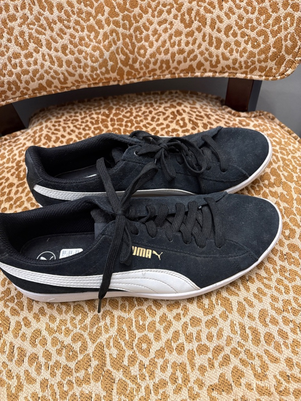 Puma Black Suede Sneakers with White Side Stripe and Gold Logo